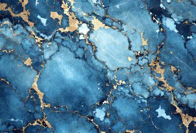The primary subject of the image is a blue and gold marbled wallpaper. The setting is a blue and gold marbled wall, which serves as the background. The visual style is a close-up of the marbled wallpaper, showcasing its intricate design. The colors and mood of the image are predominantly blue and gold, creating a luxurious and elegant atmosphere.