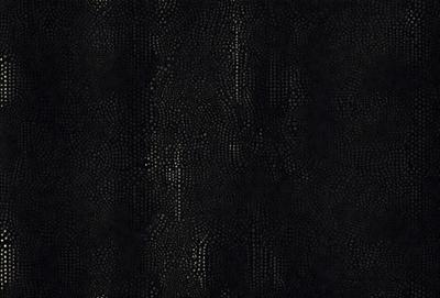 The primary subject of the image is a close-up of a black leather surface with a pattern of white dots. The setting is a dark room, and the visual style appears to be a photo. The dominant colors are black and white, creating a moody atmosphere.
