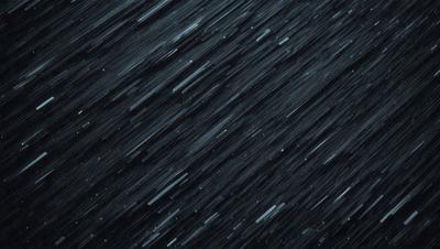 The primary subject of the image is a night sky filled with stars. The setting is a dark, cloudy night, with the stars shining brightly against the black background. The visual style is a black and white photo, which adds a sense of timelessness and nostalgia to the scene. The colors and mood are predominantly dark and moody, with the stars providing a touch of brightness and hope.