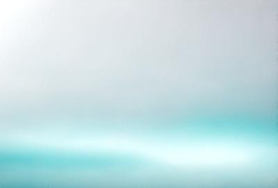 The primary subject of the image is a cloudy sky. The setting is a vast, open space with no visible landmarks or objects. The visual style is a photo, capturing the natural beauty of the cloudy sky. The colors and mood of the image are predominantly blue, creating a serene and peaceful atmosphere.