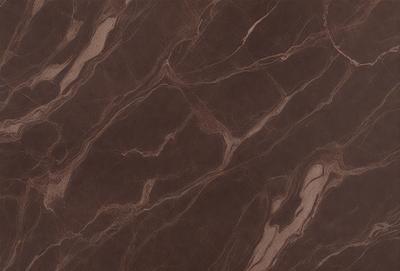 The primary subject of the image is a close-up of a brown marble countertop. The setting is a kitchen, with the countertop being the main focus of the scene. The visual style is a photo, capturing the natural texture and patterns of the marble. The colors and mood of the image are warm and earthy, with the brown marble providing a rich and natural aesthetic.