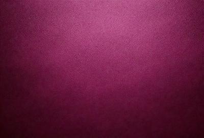 The primary subject of the image is a close-up of a maroon wall. The setting is indoors, with the wall being the main focus of the scene. The visual style appears to be a photo, as it captures the details of the wall's texture. The dominant colors in the image are maroon and pink, creating a warm and inviting atmosphere.