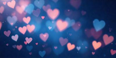 The primary subject of the image is a large number of hearts, which are scattered throughout the scene. The hearts are of various sizes and are positioned in different orientations, creating a visually engaging and dynamic composition. The setting appears to be a blue background, which adds a sense of depth and contrast to the hearts. The visual style of the image is a combination of photo and digital art, as it captures the essence of a heart pattern while maintaining a realistic and artistic quality. The colors and mood of the