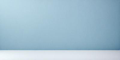 The primary subject of the image is a blue wall. The setting is a room with a blue wall, and the visual style is a photo. The dominant colors are blue, and the overall atmosphere is calm and serene.
