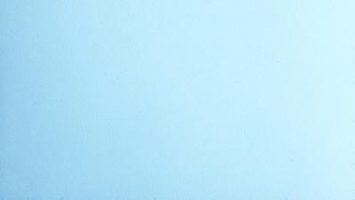 The primary subject of the image is a large, empty blue canvas. The setting is a blank, untouched surface, with no visible background or backdrop. The visual style is a simple, clean, and minimalist representation of the canvas. The colors and mood are predominantly blue, creating a calm and serene atmosphere.