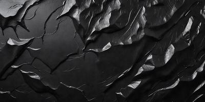 The primary subject of the image is a black leather surface with a pattern of wrinkles and folds. The setting is a dark room, and the visual style appears to be a close-up of the leather surface. The colors and mood of the image are predominantly dark and moody, with the black leather creating a dramatic and intense atmosphere.