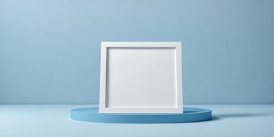 The primary subject of the image is a white picture frame. The setting is a blue background, which creates a contrasting and visually appealing scene. The visual style is a photo, capturing the details of the white frame and the blue background. The colors and mood of the image are predominantly blue, giving it a calm and serene atmosphere.