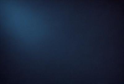 The primary subject of the image is a blue sky with a few clouds. The setting is a dark blue background, which creates a contrasting effect with the sky. The visual style is a photo, capturing the beauty of the sky and clouds. The colors and mood of the image are predominantly dark and moody, with the blue sky and clouds providing a sense of depth and tranquility.
