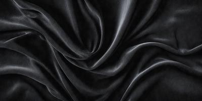 The primary subject of the image is a black fabric, which appears to be a curtain or a piece of clothing. The setting is a dark room, and the visual style is a black and white drawing or painting. The dominant colors are black and white, creating a moody and dramatic atmosphere.