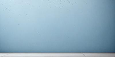 The primary subject of the image is a blue wall with a pattern of black dots on it. The setting is a white background, and the visual style appears to be a photo. The dominant colors are blue and black, creating a calm and soothing atmosphere.