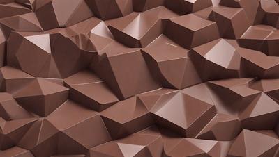 The primary subject of the image is a large, intricate, and textured surface made of brown paper. The setting is a close-up view of the paper, showcasing its unique design and texture. The visual style is a combination of a photo and digital art, as the paper appears to be a blend of both. The colors and mood of the image are warm and earthy, with the brown paper creating a sense of depth and complexity.
