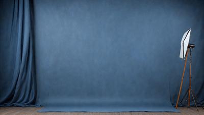 The primary subject of the image is a blue wall with a blue cloth hanging on it. The setting is a room with a blue background. The visual style is a photo of a blue wall with a blue cloth. The colors and mood are predominantly blue, creating a calm and serene atmosphere.
