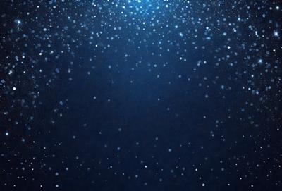 The primary subject of the image is a blue sky filled with white stars. The setting is a night sky, and the visual style is a photo. The colors and mood of the image are predominantly blue and serene, creating a peaceful and tranquil atmosphere.