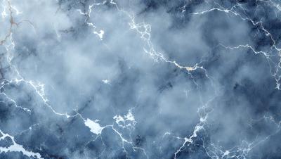 The primary subject of the image is a blue marble surface with white and grey swirls. The setting is a cloudy sky, which serves as the backdrop for the marble surface. The visual style is a close-up of the marble, showcasing its unique texture and patterns. The colors and mood of the image are predominantly blue and grey, creating a calm and serene atmosphere.