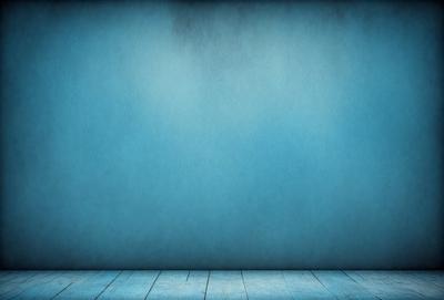 The primary subject of the image is a blue wall with a wooden floor. The setting is a room with a blue wall and a wooden floor. The visual style is a photo, and the dominant colors are blue and wooden tones. The overall atmosphere is calm and serene.