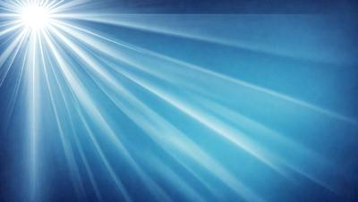 The primary subject of the image is a bright light source, possibly a sun or a light bulb, shining through a blue sky. The setting is a clear blue sky, and the visual style appears to be a photo. The colors and mood of the image are predominantly blue, creating a calm and serene atmosphere.