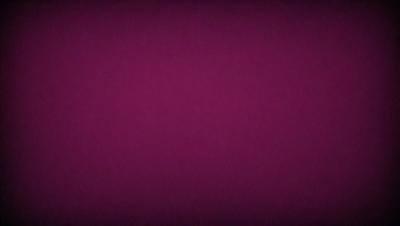 The primary subject of the image is a purple wall. The setting is a room with a purple background. The visual style is a close-up of the purple wall, which gives a sense of depth and texture. The colors and mood of the image are predominantly purple, creating a calm and serene atmosphere.