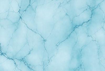 The primary subject of the image is a blue marble wall with a pattern of white streaks. The setting is a room with a blue-toned atmosphere. The visual style is a close-up of the marble wall, showcasing its unique texture and design. The colors and mood of the image are predominantly blue, creating a calm and serene environment.
