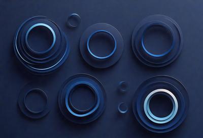 The primary subject of the image is a collection of blue circles arranged in a visually appealing manner. The setting is a blue background, which adds to the overall visual style. The circles are displayed in various sizes and positions, creating a sense of depth and dimension. The dominant colors in the image are blue, which gives the scene a calm and serene atmosphere.