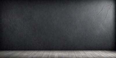 The primary subject of the image is a large, empty, and dark room with a gray wall. The setting is a plain, empty space with no visible furniture or decorations. The visual style is a black and white photo, which gives the image a classic and timeless appearance. The colors and mood are predominantly dark and moody, creating a sense of emptiness and solitude.