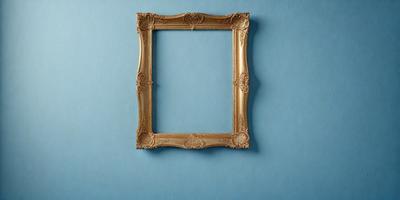 The primary subject of the image is a gold-framed picture hanging on a blue wall. The setting is a room with a blue background, and the visual style appears to be a photo. The colors in the image are predominantly blue and gold, creating a calm and elegant atmosphere.