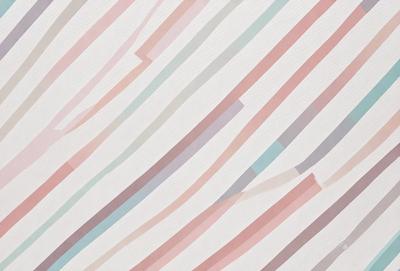 The primary subject of the image is a patterned wallpaper with a striped design. The setting is a room with a white background, and the visual style appears to be a combination of a photo and a digital art or illustration. The dominant colors in the image are pink, blue, and white, creating a warm and inviting atmosphere.