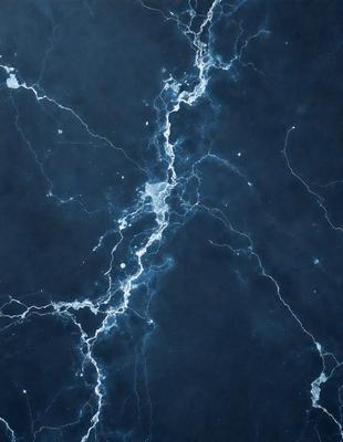 The primary subject of the image is a blue marble wall with a pattern of light and dark streaks. The setting is a dark room, and the visual style appears to be a photo. The dominant colors are blue and black, creating a moody atmosphere.