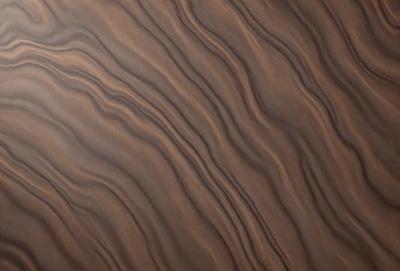 The primary subject of the image is a wooden surface with a unique and intricate pattern. The setting is a close-up view of the wooden surface, showcasing the details of the pattern. The visual style is a close-up of the wooden surface, which gives a sense of depth and texture. The colors and mood of the image are predominantly brown, creating a warm and natural atmosphere.