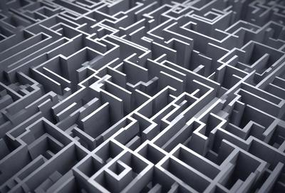The primary subject of the image is a maze, which is a complex network of interconnecting paths. The setting is a black and white background, which gives the image a classic and timeless appearance. The visual style is a combination of photo and digital art, creating a unique and intricate design. The colors and mood of the image are predominantly black and white, which adds a sense of depth and mystery to the maze.