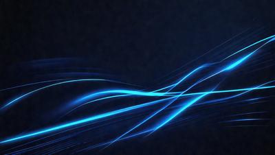The primary subject of the image is a blue light streak or wave, which appears to be a digital art or illustration. The setting is a dark background, and the visual style gives the impression of a futuristic or high-tech environment. The dominant colors in the image are blue and black, creating a sense of motion and energy.