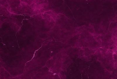 The image features a purple marbled surface with a pattern of swirls and bumps. The primary subject is the marbled surface, which serves as the setting and background of the image. The visual style is a close-up of the marbled surface, showcasing its unique texture and pattern. The colors and mood of the image are predominantly purple, creating a sense of depth and intrigue.