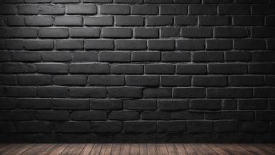 The primary subject of the image is a black brick wall. The setting is a room with a wooden floor. The visual style is a photo, and the dominant colors are black and grey. The overall atmosphere is dark and moody.