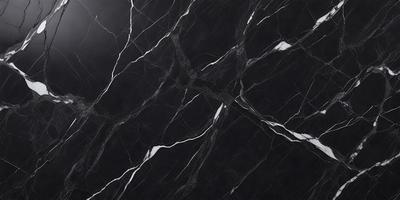 The primary subject of the image is a black and white marble pattern. The setting is a black background, and the visual style is a close-up of the marble pattern. The colors and mood of the image are predominantly black and white, giving it a classic and elegant appearance.