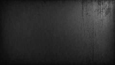 The primary subject of the image is a black background with a leather-like texture. The setting is a dark room, and the visual style is a close-up of the leather-like surface. The colors and mood of the image are predominantly dark and moody, with the black background and leather-like texture creating a dramatic and intense atmosphere.