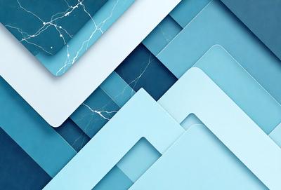 The primary subject of the image is a collection of blue and white cards, possibly business cards, arranged in a visually appealing manner. The setting is a blue background, which adds to the overall visual style of the image. The cards are displayed in a pattern, creating a sense of organization and harmony. The colors and mood of the image are predominantly blue, which gives it a calm and professional appearance.