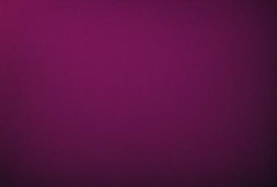 The primary subject of the image is a purple background. The setting is a dark, purple room with a wall painted in a deep shade of purple. The visual style is a close-up of the purple wall, which gives a sense of depth and intensity. The colors and mood of the image are predominantly purple, creating a calm and serene atmosphere.