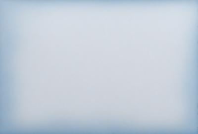 The primary subject of the image is a cloudy sky. The setting is a vast, open space with no visible landmarks or objects. The visual style is a photo, capturing the natural beauty of the cloudy sky. The colors and mood of the image are predominantly gray and moody, creating a sense of vastness and tranquility.