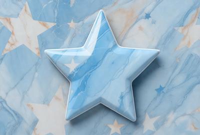 The primary subject of the image is a blue star. The setting is a marble surface, which serves as the backdrop for the star. The visual style is a close-up of the star, showcasing its details. The colors and mood of the image are predominantly blue, giving it a calm and serene atmosphere.