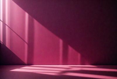 The primary subject of the image is a pink wall with a shadow cast on it. The setting is a room with a window, and the visual style appears to be a photo. The dominant colors are pink and red, creating a warm and inviting atmosphere.