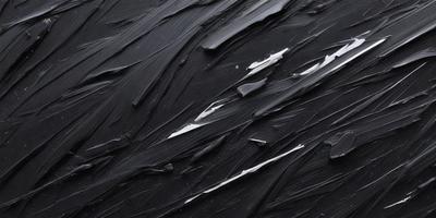 The primary subject of the image is a black and white painting of a wave. The setting is a black background, and the visual style is a painting. The dominant colors are black and white, creating a dramatic and moody atmosphere.