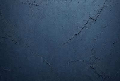 The primary subject of the image is a blue wall with a cracked and chipped appearance. The setting is a room with a blue background. The visual style is a close-up of the wall, showcasing its texture and imperfections. The colors and mood of the image are predominantly blue, giving it a calm and serene atmosphere.