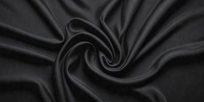 The primary subject of the image is a close-up of a black fabric, possibly a piece of clothing or a curtain. The setting is a dark background, which emphasizes the fabric's texture and pattern. The visual style appears to be a close-up or a detailed view of the fabric. The colors and mood of the image are predominantly dark, with the black fabric being the main focus.