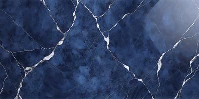 The primary subject of the image is a blue marble wall with a pattern of white and blue streaks. The setting is a room with a blue tiled floor. The visual style is a close-up of the marble wall, showcasing its unique texture and design. The colors and mood of the image are predominantly blue, creating a calm and serene atmosphere.