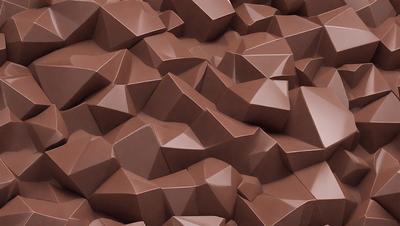 The image features a large, intricate design made of brown and white geometric shapes. The design is reminiscent of a mountain landscape, with a mix of brown and white colors. The shapes are arranged in a way that creates a visually striking pattern, making the design appear both complex and harmonious. The overall atmosphere of the image is one of creativity and artistic expression.