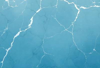 The primary subject of the image is a blue marble wall with white veins. The setting is a room with a blue tiled wall. The visual style is a close-up of the marble wall, showcasing its unique texture and design. The colors and mood of the image are predominantly blue, creating a calm and serene atmosphere.
