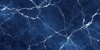 The primary subject of the image is a blue wall with a pattern of white and blue swirls. The setting is a room with a blue background, and the visual style appears to be a digital art or illustration. The dominant colors are blue and white, creating a calm and soothing atmosphere.
