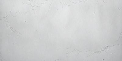 The primary subject of the image is a white sheet of paper with a pattern of black lines. The setting is a white background, and the visual style appears to be a combination of a photo and a drawing. The colors are predominantly white and black, creating a clean and minimalist atmosphere.