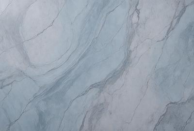 The primary subject of the image is a marble tile with a blue and white color scheme. The setting is a bathroom, as indicated by the presence of the marble tile. The visual style is a close-up of the tile, showcasing its intricate design and texture. The colors and mood of the image are predominantly blue and white, creating a clean and elegant atmosphere.