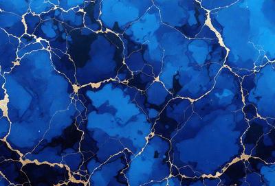 The primary subject of the image is a blue and gold patterned wallpaper. The setting is a blue and gold wallpapered room. The visual style is a close-up of the wallpaper, showcasing the intricate design. The dominant colors are blue and gold, creating a warm and inviting atmosphere.