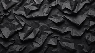 The primary subject of the image is a black and white paper, which is the main object, scene, or focus of the image. The setting is a black background, and the visual style is a photo. The colors and mood of the image are predominantly black and white, giving it a classic and timeless appearance.